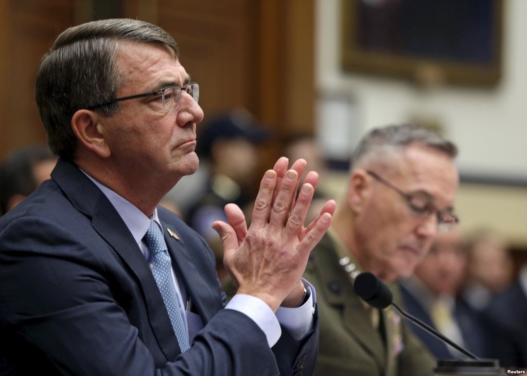 U.S. Defense Secretary Ash Carter left and Joint Chiefs Chairman Marine Corps Gen. Joseph Dunford Jr. testify before a House Armed Services Committee hearing on'U.S. Strategy for Syria and Iraq' in Washington Dec. 1 2015