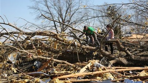 Volunteers help with clean up at Calvary Baptist Church following a tornado