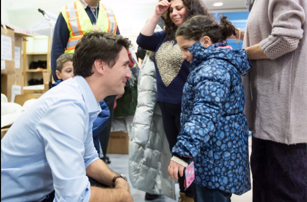 Syrian refugees headed to Canada on first planeload