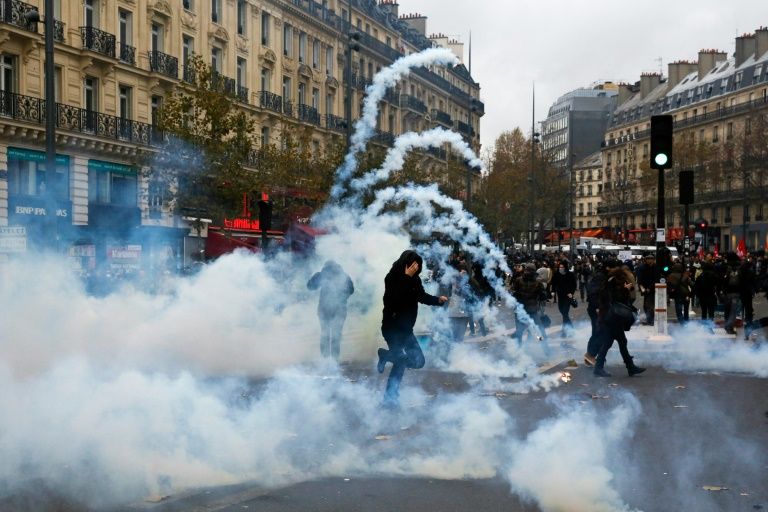 Paris police detain 208 after climate change demo