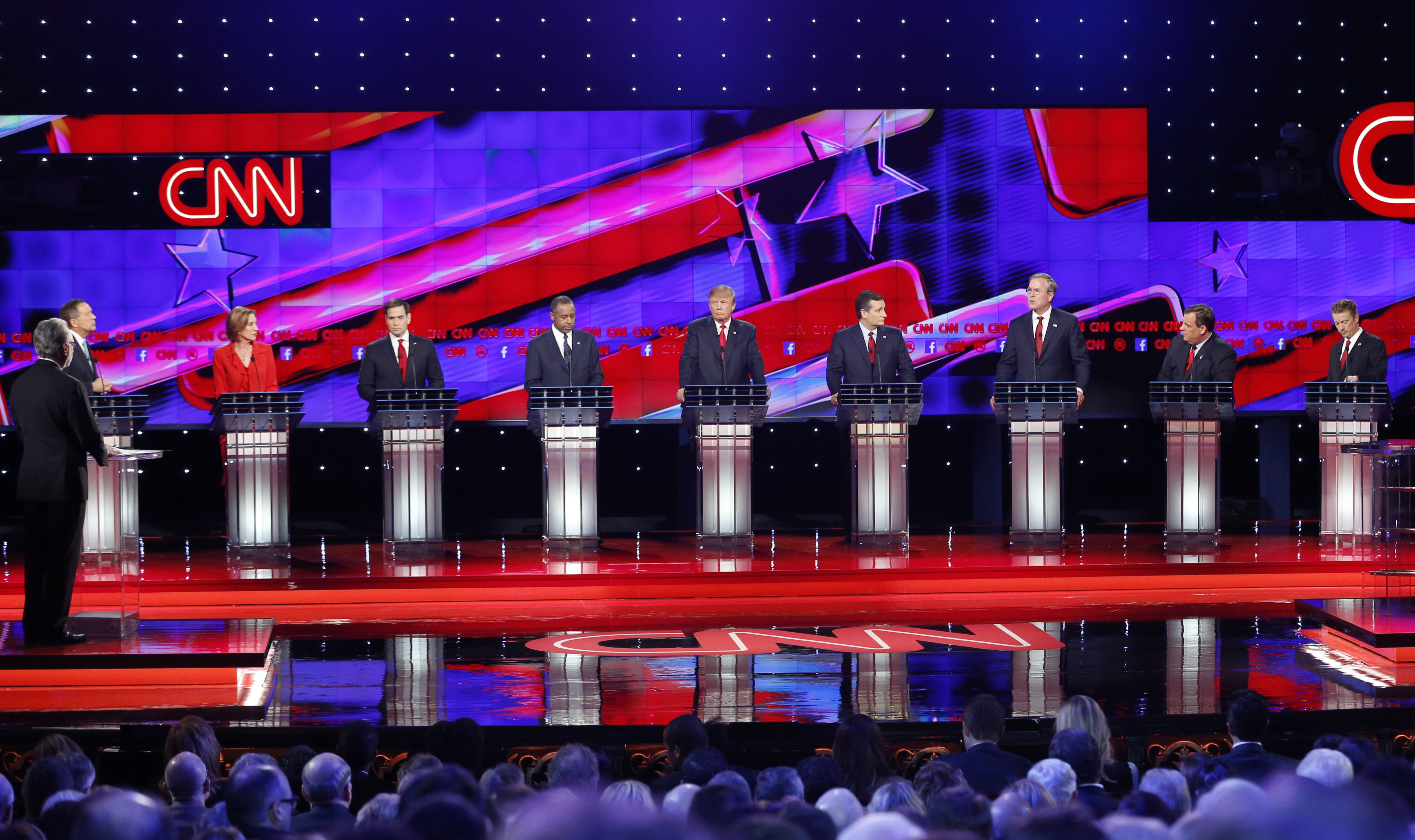 Republican presidential candidates from left John Kasich Carly Fiorina Marco Rubio Ben Carson Donald Trump Ted Cruz Jeb Bush Chris Christie and Rand Paul respond to debate moderator Wolf Blitzer far left during the CNN Republican presidential