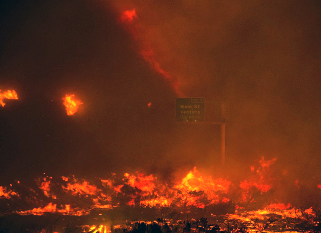 Topete fire overruns the state Highway 101 near Ventura Calif. Saturday Dec. 26 2015. The wind-whipped wildfire closed