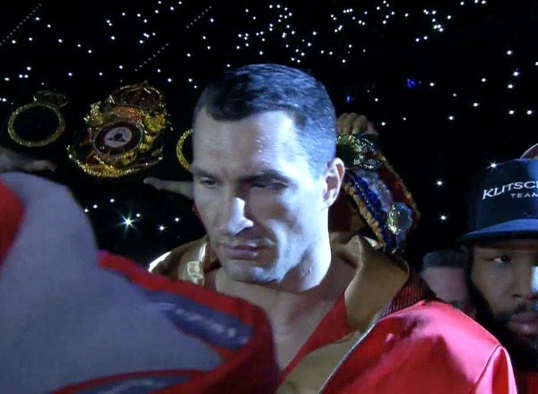 Wladimir Klitschko right and Britain's Tyson Fury exchange blows