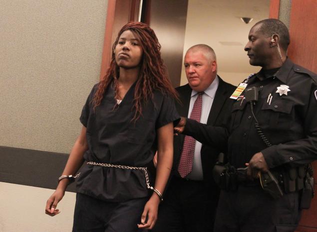 Lakeisha Nicole Holloway accused of smashing her car into crowds of pedestrians on the Las Vegas Strip on Sunday enters court on Wednesday