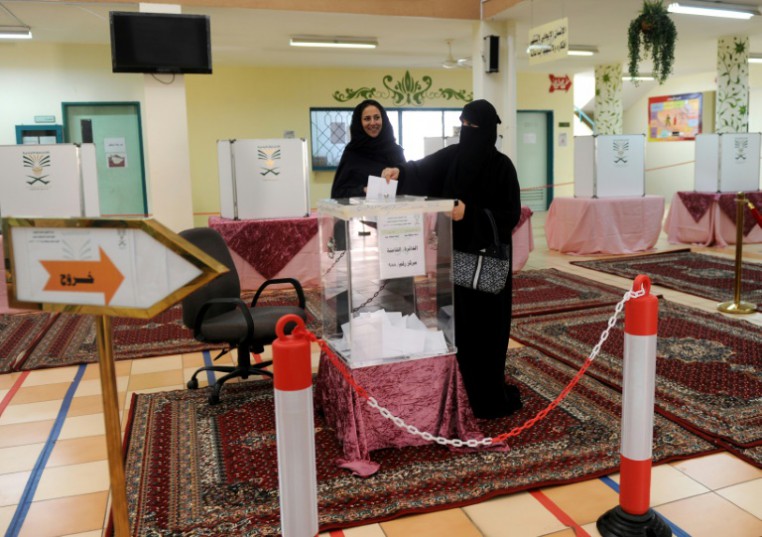 AFP -A Saudi woman casts her ballot at a polling station in the coastal city of Jeddah