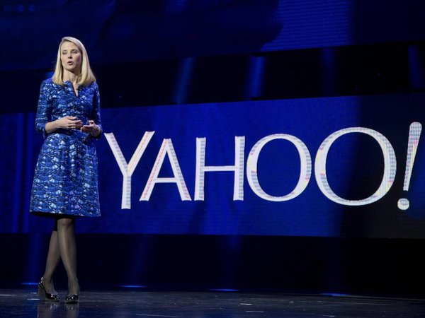 Yahoo president and CEO Marissa Mayer speaks during the International Consumer Electronics Show in Las Vegas. Yahoo announced Wednesday Dec. 9 2015 it is scrapping its original plan to spin off its prized stake