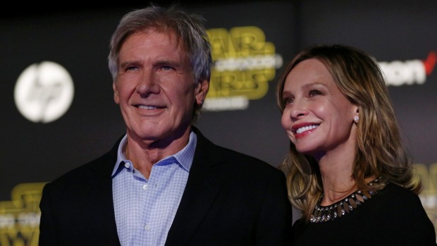 Actor Harrison Ford and his wife actress Calista Flockhart arrive at the premiere of'Star Wars The Force Awakens in Hollywood California