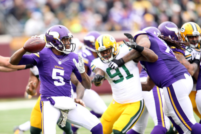 Vikings quarterback Teddy Bridgewater back to throw during the first quarter at the Minnesota Vikings game versus Green Bay Packers at TCF Bank Stadium in Minneapolis MN. Packers 24 and Vikings 21