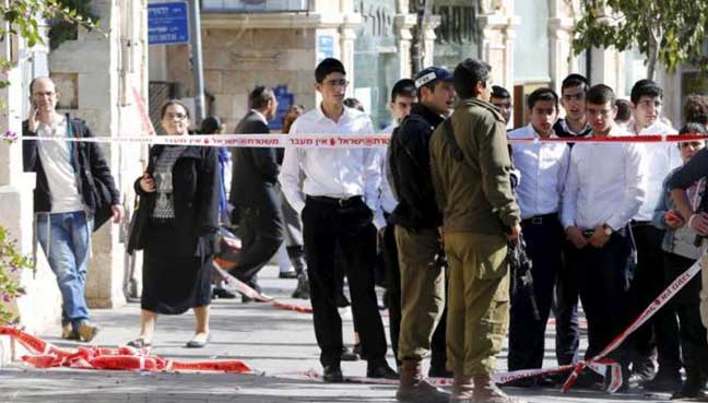 Police: 1 attacker killed after stabbing 3 Israelis