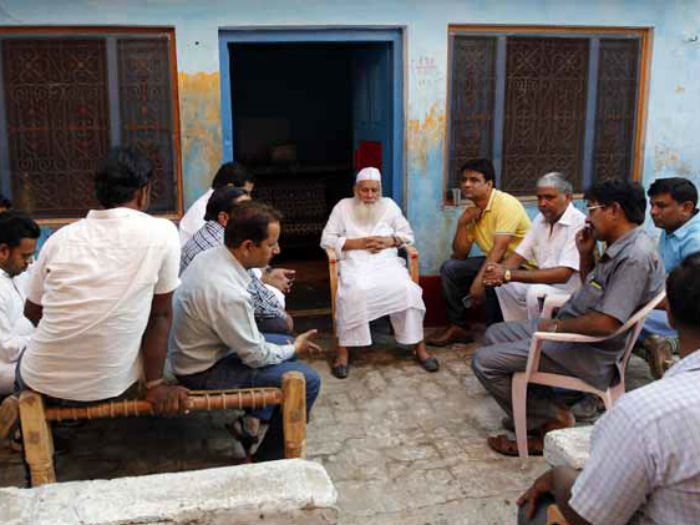 Relatives gather at the home of 50-year-old Muslim farmer Mohammad Ikhlaq after he was killed in Bisara a village about 45 kilometers southeast of New Delhi on Wednesday Sept. 30 2015