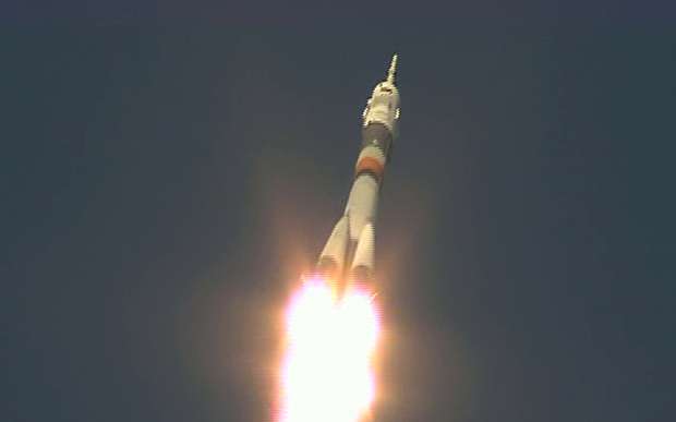 Rocket blasts off to space station with Russian American and Briton