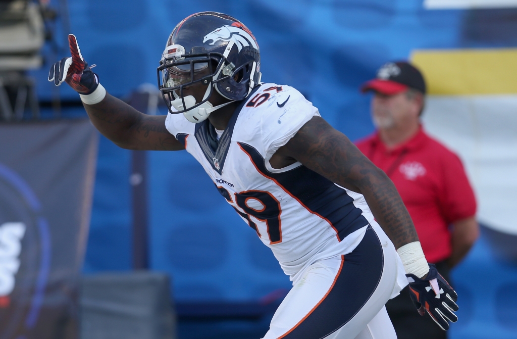 SAN DIEGO CA- DECEMBER 06 Linebacker Danny Trevathan #59 of the Denver Broncos celebrates after returning his interception 25 yards for a touchdown in the first quarter against the San Diego Chargers at Qualcomm Stadium