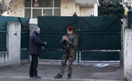 A French soldier secures the access to a Jewish school in Marseille 9th district France on Jan. 11