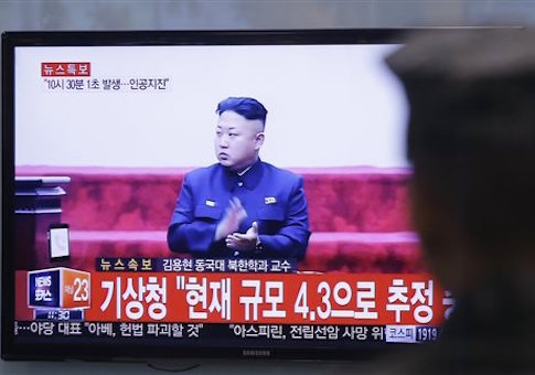 A South Korean soldier observes TV image of youthful North Korean leader Kim Jong Un  Ahn Young Soon  AP