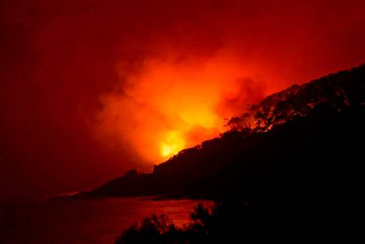 A bushfire burns at Wye River near Lorne south of Melbourne