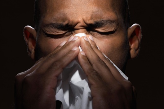 Man Blowing His Nose