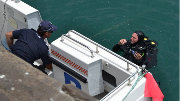 A police diver at Brennan Wharf in Port Lincoln