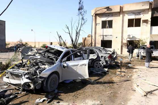 A suicide bomber killed six people Thursday at a checkpoint in Libyan town named Ras Lanouf