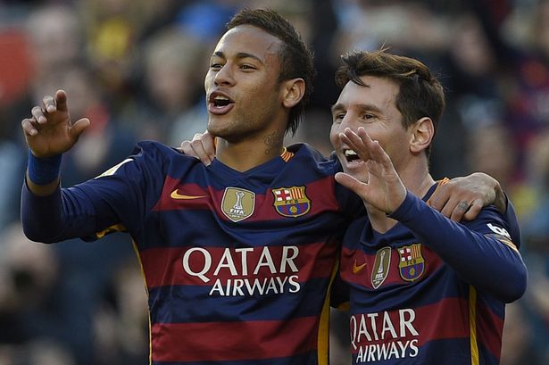 Lionel Messi celebrates a goal with Neymar