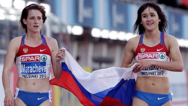 Yelena Arzhakova of Russia celebrates with compatriot Irina Maracheva after winning at the women's 800 metres at 2012 Euro Championships. They both lost their medals