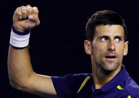 Novak Djokovic of Serbia celebrates after defeating Kei Nishikori of Japan in their quarterfinal match at the Australian Open tennis championships in Melbourne Australia Tuesday Jan. 26 2016