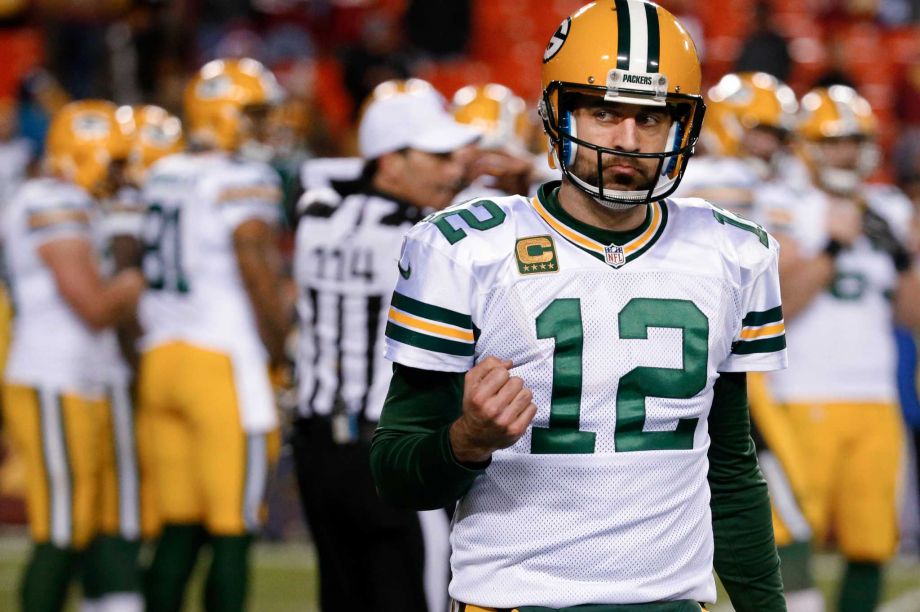 Green Bay Packers quarterback Aaron Rodgers pumps his fist as he walks off the field in the closing minutes of the team's NFL wild-card playoff football game against the Washington Redskins in Landover Md. Sunday Jan. 10 2016. The Packers won 35-18. P