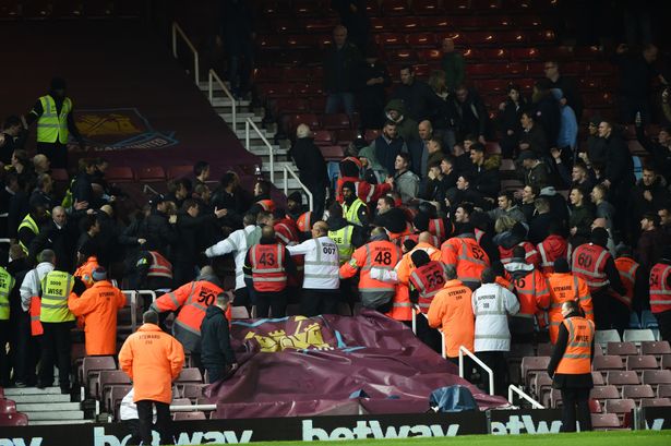 West Ham and Manchester City fans clash after the game