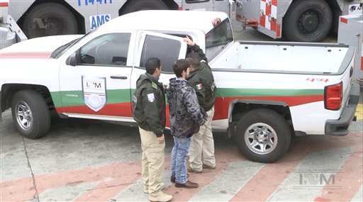 This frame grab taken from a Thursday Jan. 28 2016 video provided by Mexico's Instituto Nacional de Migracion INM shows Ethan Couch as he is escorted by Mexican immigration agents upon their arrival to the international airport in Mexico City. INM