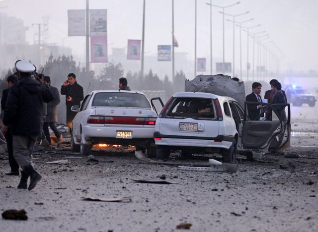 Afghan soldiers inspect the site of a suicide bomb blast near the Russian embassy in Kabul Afghanistan 20 January 2016. EPA