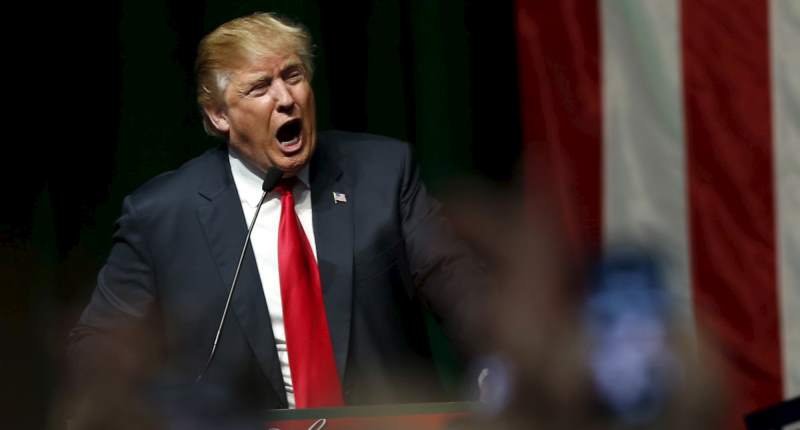 Republican presidential candidate Donald Trump addresses the crowd during a campaign rally in Grand Rapids Michigan on Dec. 21 2015