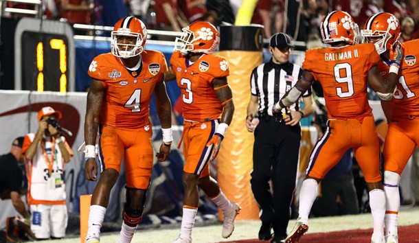 Dec 31 2015 Miami Gardens FL USA Clemson Tigers running back Wayne Gallman and quarterback Deshaun Watson celebrate after scoring against the Oklahoma Sooners during the third quarter of the 2015 CFP semifinal at the Orange Bowl at Sun Life S