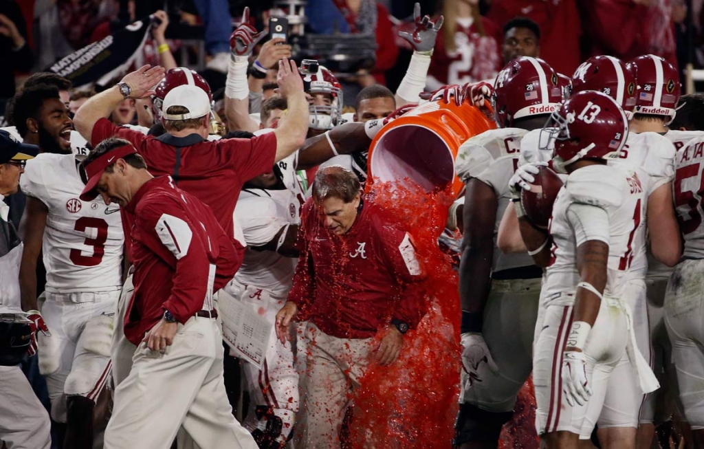 Alabama head coach Nick Saban gets doused after the NCAA college football playoff championship game against Clemson Monday Jan. 11 2016 in Glendale Arizona