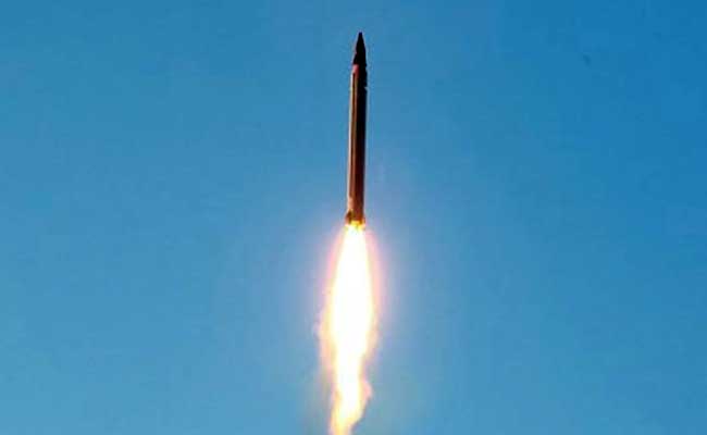 An Iranian Emad rocket is launched as it is tested at an undisclosed locati