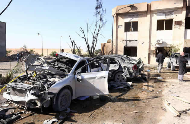 Libyans gather at the site of a suicide truck bombing on a police school in Libya's coastal city of Zliten some 170km east of the capital Tripoli which killed at least 60 people and injured another 200 on Thursday.- AFP  Getty Images