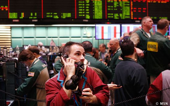 An Oil Trader Works On The NYMEX Trading Floor New York As Brent Crude Oil Falls Below $28 A Barrel