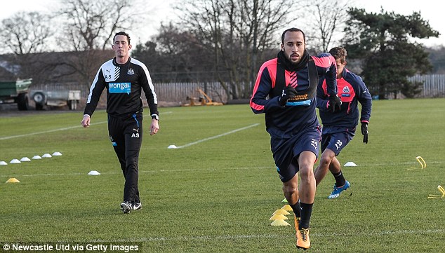 Andros Townsend runs on the pitch during drills at The Newcastle United Training Centre on Thursday