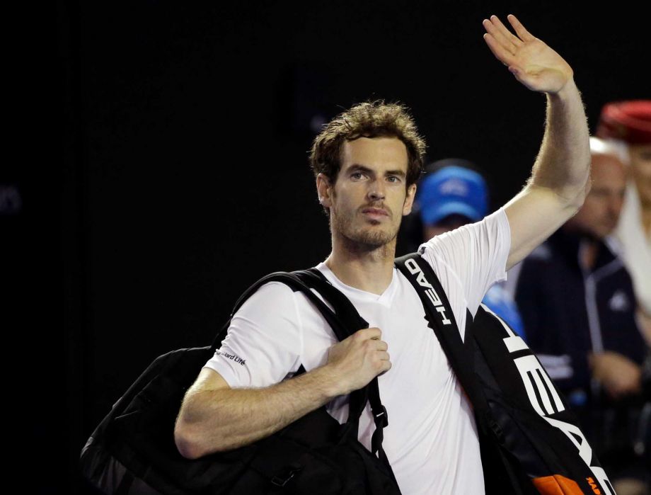 Andy Murray of Britain waves as he leaves Rod Laver Arena following his win over Milos Raonic of Canada in their semifinal match at the Australian Open tennis championships in Melbourne Australia Friday Jan. 29 2016