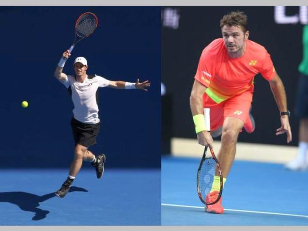 Andy Murray and Stan Wawrinka in action during the Australian Open tennis tournament in Melbourne on Thursday