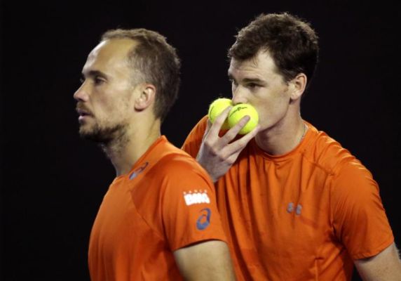 Jamie Murray right of Britain talks to partner