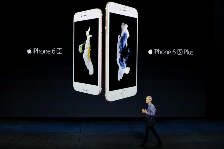 Apple CEO Tim Cook discusses the new iPhone 6s and iPhone 6s Plus during the Apple event at the Bill Graham Civic Auditorium in San Francisco. Most analysts believe Apple surpassed its own record by sel