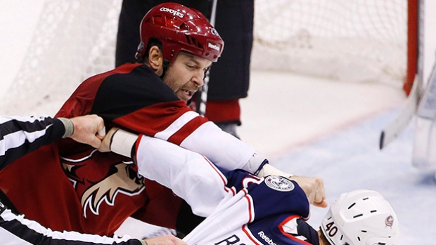 Arizona Coyotes&#39 John Scott commonly known around the league as a fighter and not a goal scorer was named an all-star game captain after fans voted him in as the representative for the Pacific division