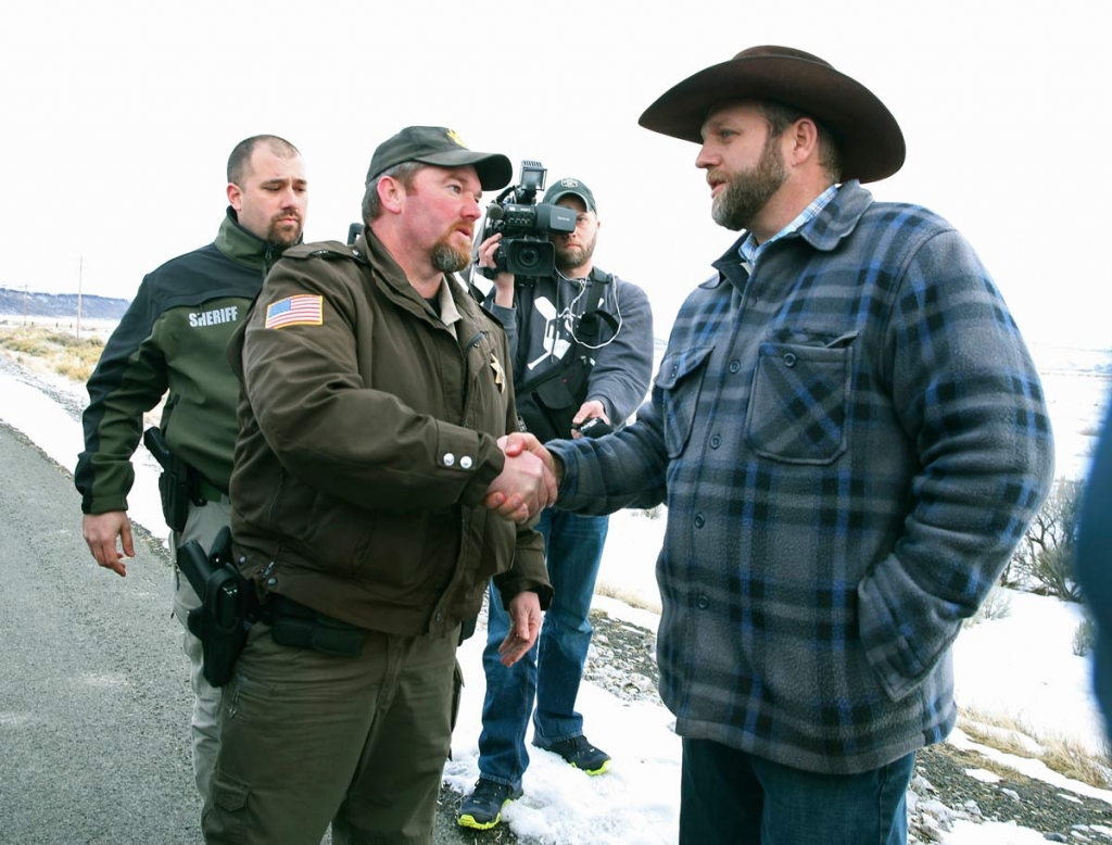 Harney County Sheriff Dave Ward meets with Ammon Bundy at a remote location outside the Malheur National Wildlife Refuge on Thursday Jan. 7 2016 near Burns Oregon