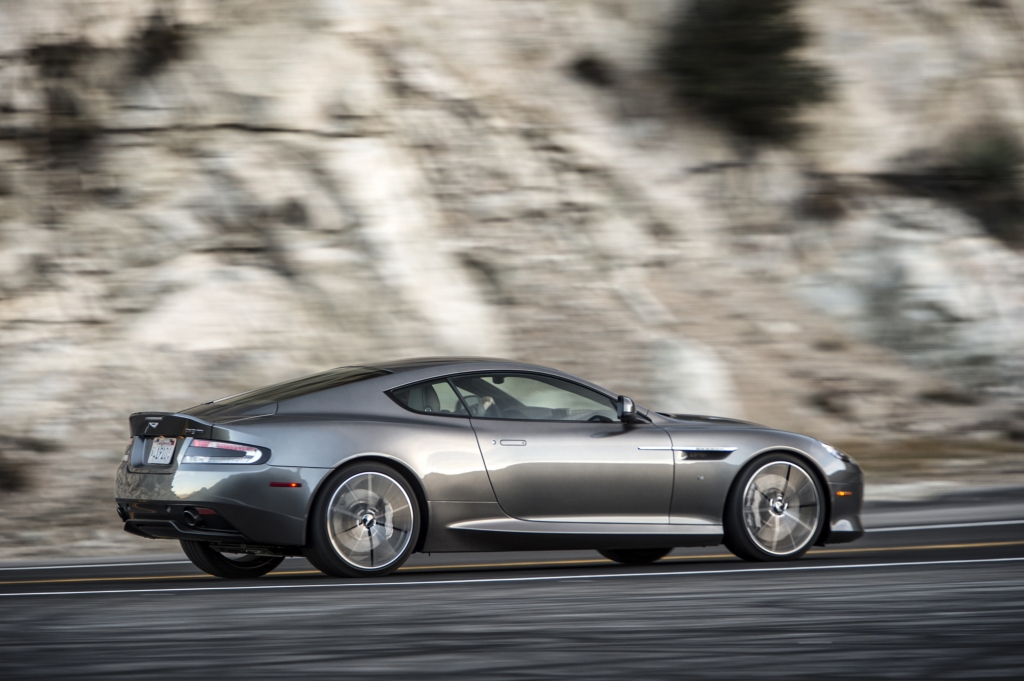 2016 Aston Martin DB9 GT rear three quarter in motion