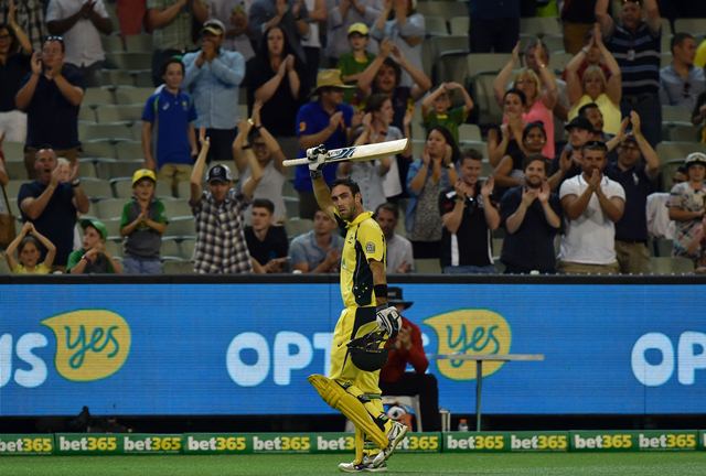 Australia's batsman Glenn Maxwell walks back to the pavilion following his 96-run innings against India in the third one-day international cricket match between India and Australia at the MCG in Melbourne