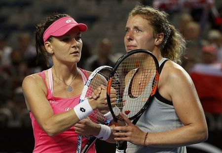 UK-TENNIS-OPEN-RADWANSKA:Radwanska escapes after Friedsam suffers injury