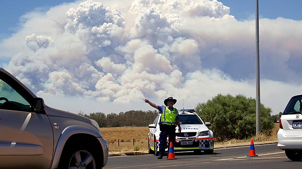 Official says wildfires blazing out of control in Western Australia have destroyed 95 homes