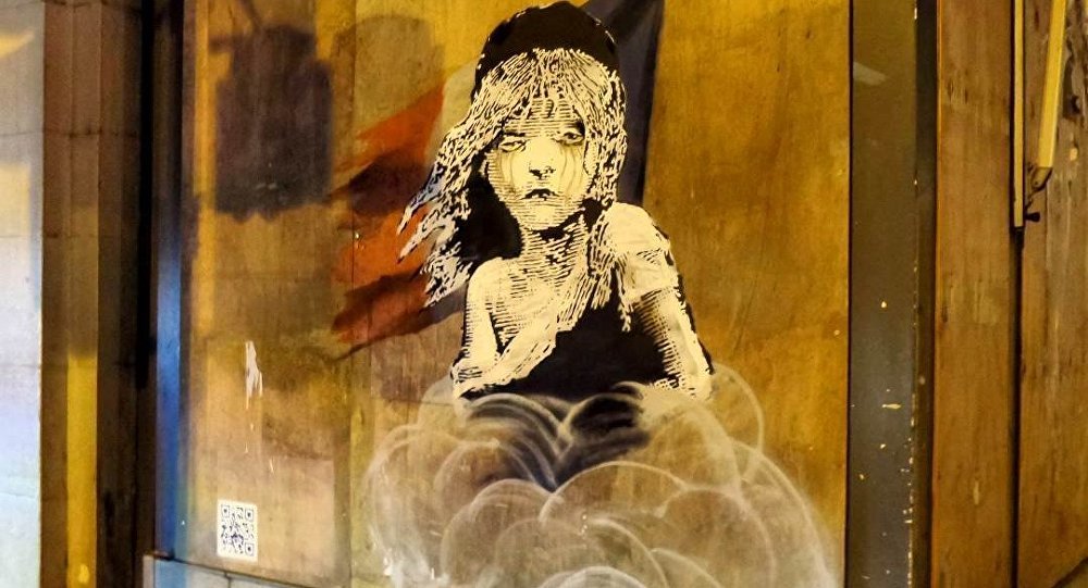 Banksy's mural opposite the French embassy in London highlighting the use of teargas on refugees by the French police