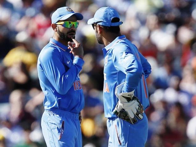 Indian ODI captain M.S. Dhoni and his vice-captain Virat Kohli discussing a strategy during an ODI match against Australia