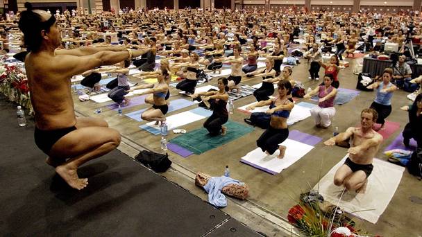 Bikram Choudhury leading a yoga class at the Los Angeles Convention Centre in 2003