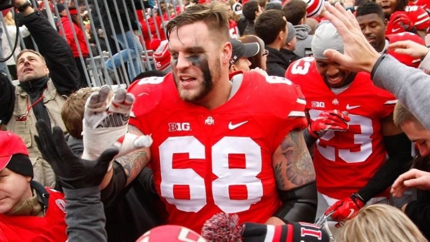 Nov 29 2014 Columbus OH USA Ohio State Buckeyes offensive lineman Taylor Decker celebrates with fans following the game versus the Michigan Wolverines at Ohio Stadium. Ohio State won the game 42-28. Mandatory Credit Joe Maiorana-USA TODAY Sport